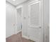 Hallway with neutral carpet and fresh paint leading to other rooms in the home at 1182 25Th N Way, St Petersburg, FL 33713