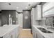 Bright kitchen featuring granite countertops, sink, and stainless steel appliances at 1182 25Th N Way, St Petersburg, FL 33713