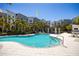 Sparkling community pool with inviting lounge area and lush landscaping around modern townhomes at 1182 25Th N Way, St Petersburg, FL 33713