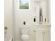 Bright bathroom featuring a tiled shower/tub combo, neutral decor, and a matching vanity with storage at 11829 Sparkling Topaz Cv, Parrish, FL 34219