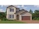 Charming two-story home featuring a brick driveway, a two-car garage, and well-maintained landscaping at 11829 Sparkling Topaz Cv, Parrish, FL 34219