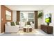 Comfortable living room with stylish decor, a large sectional sofa, and a modern entertainment center at 11829 Sparkling Topaz Cv, Parrish, FL 34219