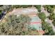 Aerial view of park with basketball court surrounded by shady trees and landscaping at 1207 E Giddens Ave, Tampa, FL 33603