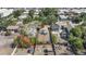 Aerial view of the property showing the house, fenced yard, storage shed, and surrounding neighborhood at 1207 E Giddens Ave, Tampa, FL 33603