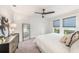 Comfortable bedroom featuring soft carpet, generous natural light, and modern furnishings at 1207 E Giddens Ave, Tampa, FL 33603