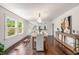 Elegant dining room with modern lighting and ample seating at 1207 E Giddens Ave, Tampa, FL 33603