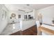 Bright kitchen with granite countertops, white cabinets and tile floors at 1207 E Giddens Ave, Tampa, FL 33603