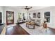 Bright living room featuring hardwood floors and ample natural light at 1207 E Giddens Ave, Tampa, FL 33603