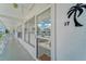 Exterior view of unit 17 featuring a secured entryway and clear view of landscaping at 1221 Drew St # B17, Clearwater, FL 33755