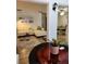 Inviting living room with modern decor, including a white sectional and stylish wood flooring at 1221 Drew St # B17, Clearwater, FL 33755