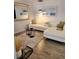 Bright living room showcasing stylish decor, a comfortable sectional, and sleek flooring at 1221 Drew St # B17, Clearwater, FL 33755