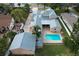 Bird's eye view of the property highlighting the backyard pool, spacious layout, and detached garage at 13211 Park Blvd, Seminole, FL 33776