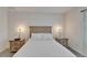 Comfortable bedroom featuring neutral color scheme and bedside lamps at 138 Mangrove Shade Cir, Apollo Beach, FL 33572