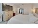 Bedroom showcasing a dresser and decorative lamp at 138 Mangrove Shade Cir, Apollo Beach, FL 33572