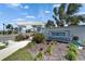 Welcoming entrance to Mangrove Point with manicured landscaping and clear community signage at 138 Mangrove Shade Cir, Apollo Beach, FL 33572