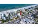 Aerial view of property, showcasing proximity to the sandy beach and the Gulf Coast at 1412 Gulf Blvd # 103A, Indian Rocks Beach, FL 33785