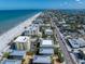 Scenic aerial view of beachfront condos, beach access and homes along the Gulf of Mexico at 1412 Gulf Blvd # 103A, Indian Rocks Beach, FL 33785