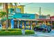 Beach Waves Grill exterior with colorful facade, open storefront, and street view at 1412 Gulf Blvd # 103A, Indian Rocks Beach, FL 33785