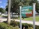 Entrance sign to the community Nature Preserve, promoting local flora, fauna and outdoor activities at 1412 Gulf Blvd # 103A, Indian Rocks Beach, FL 33785