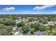 Wide aerial shot showcasing a lush neighborhood with single-Gathering homes and green landscapes at 1530 High Knoll Dr, Brandon, FL 33511