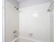 A tiled shower and bath combination complete this functional bathroom space at 1530 High Knoll Dr, Brandon, FL 33511