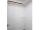 Walk-in closet features a wooden clothing bar, maximizing storage space at 1530 High Knoll Dr, Brandon, FL 33511