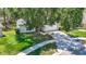 View of a well maintained home with an attached garage and a lush green lawn at 1530 High Knoll Dr, Brandon, FL 33511