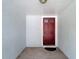 Entryway featuring a traditional front door with decorative hardware and a welcome mat at 1530 High Knoll Dr, Brandon, FL 33511