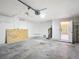 Bright two-car garage with concrete floor and access to the house at 1530 High Knoll Dr, Brandon, FL 33511