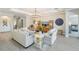 Cozy living room featuring comfortable seating, elegant decor, and a warm ambiance at 16677 Vibrato Ln, Land O Lakes, FL 34638