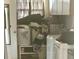 Laundry room featuring plenty of storage space at 17026 State Road 54, Lutz, FL 33558