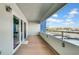 An expansive balcony boasting city views and providing access to the outdoors at 17400 Gulf Blvd # I4, North Redington Beach, FL 33708