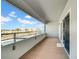 A spacious outdoor balcony offering a view of the surrounding city and sky at 17400 Gulf Blvd # I4, North Redington Beach, FL 33708