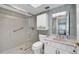 Modern bathroom featuring a glass shower, vanity, and ample lighting at 17400 Gulf Blvd # I4, North Redington Beach, FL 33708
