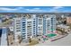 Beachfront condo building featuring a pool and easy access to the sandy shores and ocean views at 17400 Gulf Blvd # I4, North Redington Beach, FL 33708
