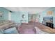 An open floor plan including the living and dining rooms with natural lighting at 17400 Gulf Blvd # I4, North Redington Beach, FL 33708