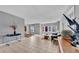 Open-concept living room with tile floors and lots of natural light at 17400 Gulf Blvd # J7, Redington Shores, FL 33708