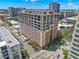 Building aerial view showcasing architectural details, urban setting, and nearby street activity at 175 2Nd S St # 907, St Petersburg, FL 33701