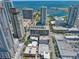 Cityscape aerial view capturing the building's location near the waterfront and other high-rise structures at 175 2Nd S St # 907, St Petersburg, FL 33701
