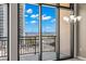 Expansive windows offer stunning balcony views of the water and skyline at 175 2Nd S St # 907, St Petersburg, FL 33701