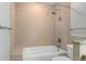 Bathroom with tiled shower, tub, and toilet at 175 2Nd S St # 907, St Petersburg, FL 33701