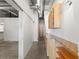 Long hallway with overhead storage and sliding doors, offering ample space and a modern aesthetic at 175 2Nd S St # 907, St Petersburg, FL 33701