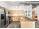 Well-equipped kitchen featuring granite counters and stainless appliances at 175 2Nd S St # 907, St Petersburg, FL 33701