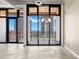 Bright living room with floor-to-ceiling windows showcasing stunning views of the water and cityscape at 175 2Nd S St # 907, St Petersburg, FL 33701