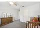 Bedroom with a dresser, crib, and closet at 1927 Curry Rd, Lutz, FL 33549