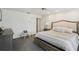 Main bedroom with carpet, ceiling fan, ensuite bath and walk in closet at 1927 Curry Rd, Lutz, FL 33549