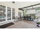 Inviting patio with outdoor dining area, perfect for entertaining at 1927 Curry Rd, Lutz, FL 33549