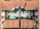 Bird's-eye view of the complex highlighting its layout, pool, courtyard, and landscaping at 200 4Th S Ave # 303, St Petersburg, FL 33701