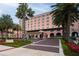 Grand hotel exterior with lush gardens and a welcoming entrance, surrounded by palm trees at 200 4Th S Ave # 303, St Petersburg, FL 33701
