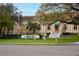 Charming view of Mirror Lake Community Library with manicured lawns and traditional architecture at 200 4Th S Ave # 303, St Petersburg, FL 33701